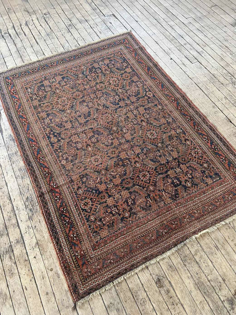 antique vintage area rug sustainable home decor at Woven Kin Home