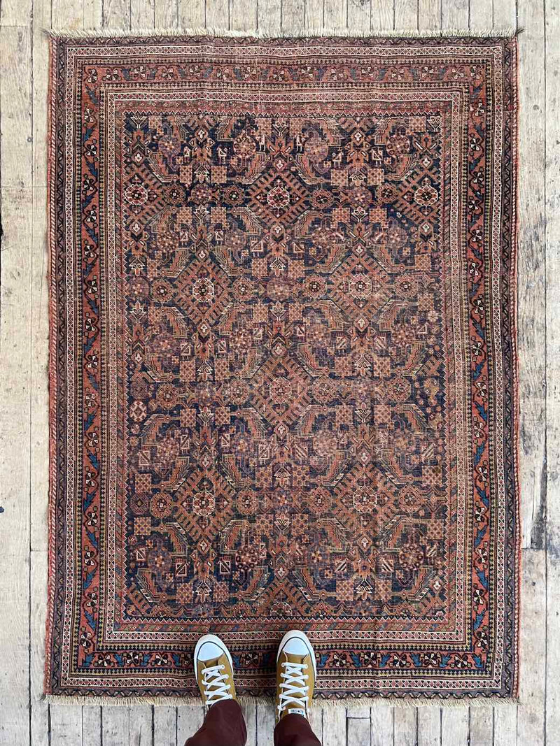 antique vintage area rug sustainable home decor at Woven Kin Home