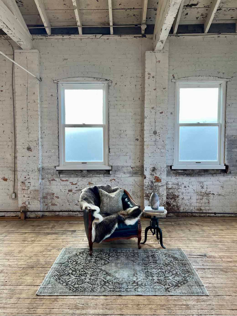 antique Persian accent rug sustainable home decor at Woven Kin Home