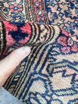 Antique Persian area rug  close-up of pile