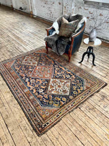 antique Persian area rug at Woven Kin Home sustainable home decor