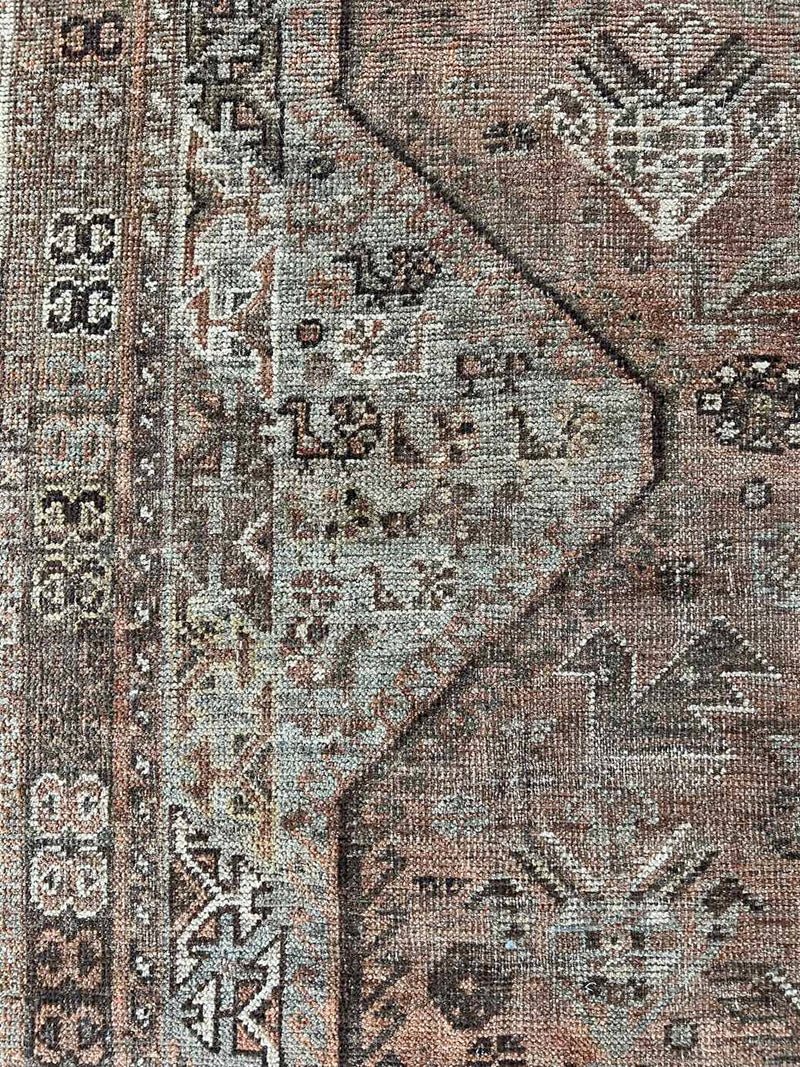 Antique Persian area rug sustainable home decor at Woven Kin Home