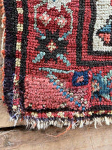 Close-up of a Vintage Persian area rug repair