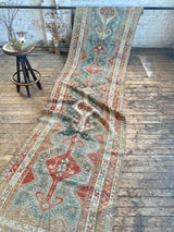 antique Persian runner rug at Petrichor Vintage Co.