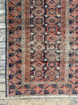 antique Perian accent rug
