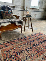 antique Perian accent rug