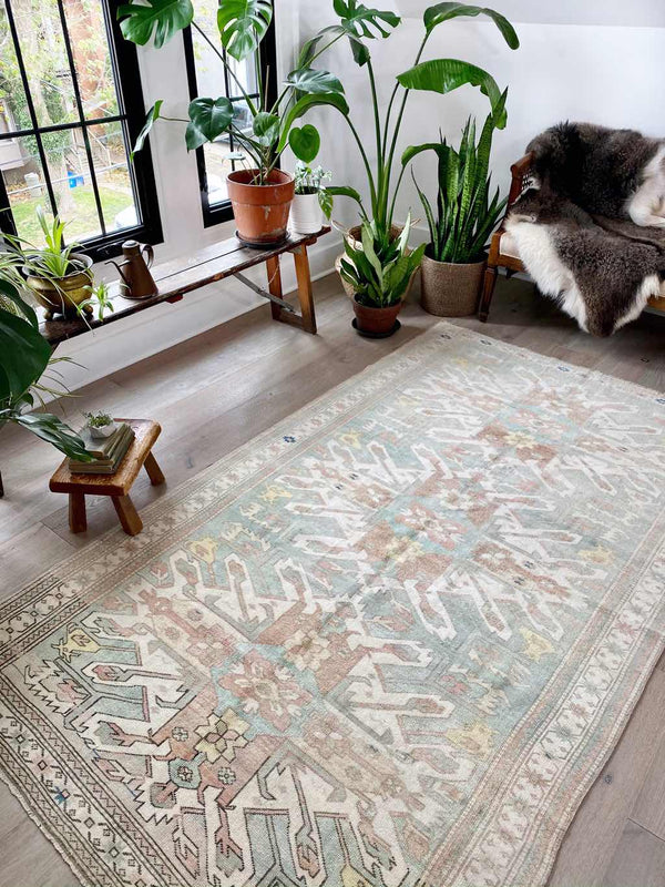 muted color vintage Turkish rug