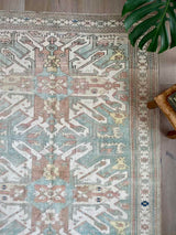 muted color vintage Turkish rug