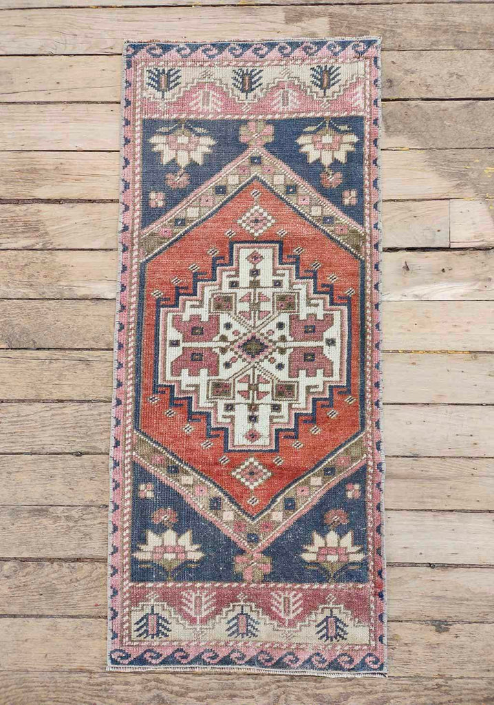 Vintage Turkish accent rug at Woven Kin Home